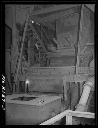 Anaconda smelter, Montana. Anaconda Copper Mining Company. The Symons crusher which reduces ore in size from a maximum of four inches to one inch before it is sent to the 20,000 ton ore storage bins