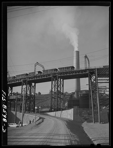 Anaconda smelter, Montana. Anaconda Copper Mining Company. Ore cars and smokestack