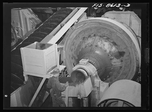 Anaconda smelter, Montana. Anaconda Copper Mining Company. Hardinge ballmill where the copper ore is ground to the consistency of flour. At the upper left is the classifier where the slimy material is separated from the granular material, the latter of which returned to the ballmill for further grin