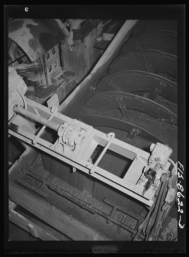 Anaconda smelter, Montana. Anaconda Copper Mining Company. Classifier which removes the slimy material from the granular material after it has passed through the ballmills; the slimy material is removed and the granular material returns to ballmill for more grinding