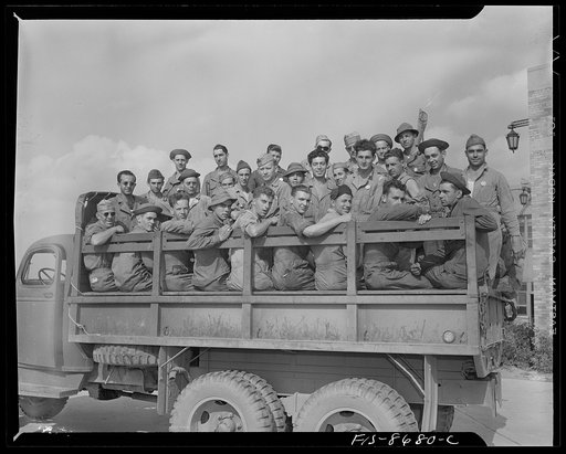 Wayne County Airport, a United States Army Air Corps air ferry command base sixteen miles from Detroit, Michigan. Enlisted mechanics and repair men going back to their barracks for mess