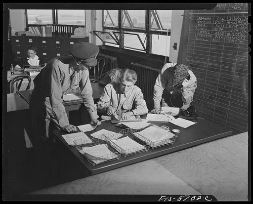Wayne County Airport, a United States Army Air Corps air ferry command base sixteen miles from Detroit, Michigan. After checking the weather, Lieutenant Benton gives his arrival time