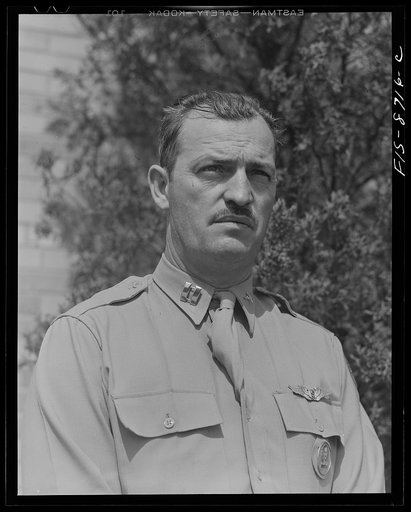 Wayne County Airport, a United States Army Air Corps air ferry command base sixteen miles from Detroit, Michigan. Captain Clarence Smith, of Holland, Michigan, who was formerly a commercial airplane pilot