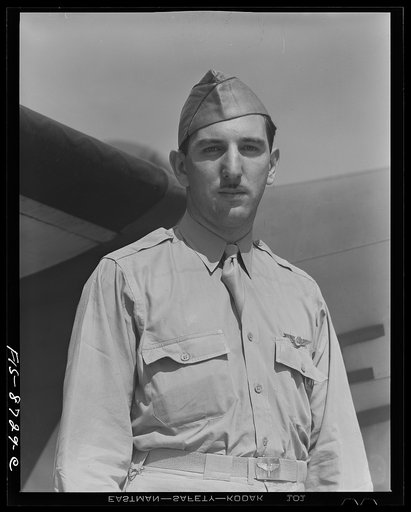 Wayne County Airport, a United States Army Air Corps air ferry command base sixteen miles from Detroit, Michigan. Mr. Reitman, a civilian pilot