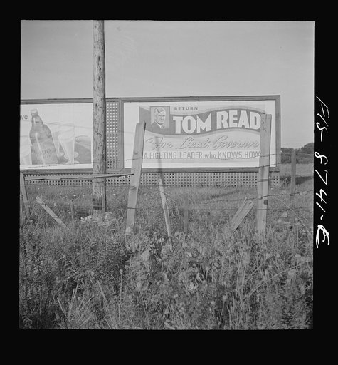 Wayne County Airport, a United States Army Air Corps air ferry command base sixteen miles from Detroit, Michigan. Political sign near the ferry command field