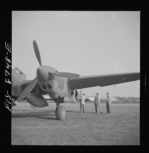 Wayne County Airport, a United States Army Air Corps air ferry command base sixteen miles from Detroit, Michigan. Factory inspector and Captain Roddy