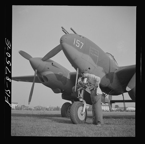 Wayne County Airport, a United States Army Air Corps air ferry command base sixteen miles from Detroit, Michigan. Factory inspector and Captain Roddy