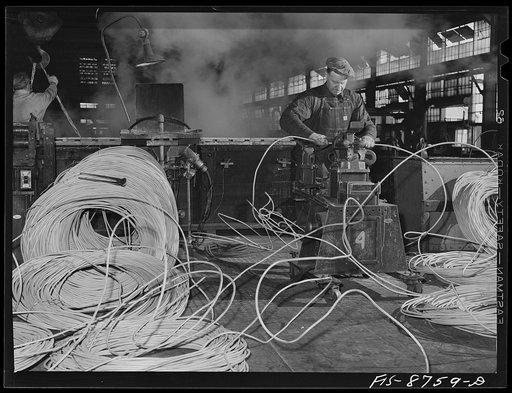 Great Falls, Montana. Anaconda Wire and Cable Company. Making an electro-weld to join two pieces of copper wire