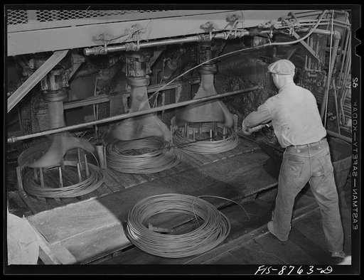 Great Falls, Montana. Anaconda Wire and Cable Company. After copper wire is drawn through various dies to the desired size, it is formed into coils by a fishtail winder