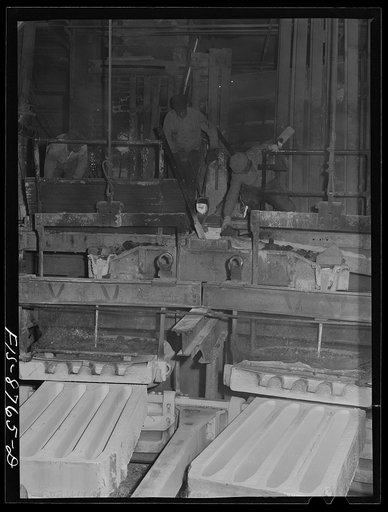 Untitled photo, possibly related to: Great Falls, Montana. Anaconda Wire and Cable Company. Pouring copper wire bars