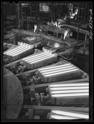 Great Falls, Montana. Anaconda Wire and Cable Company. Pouring copper wire bars