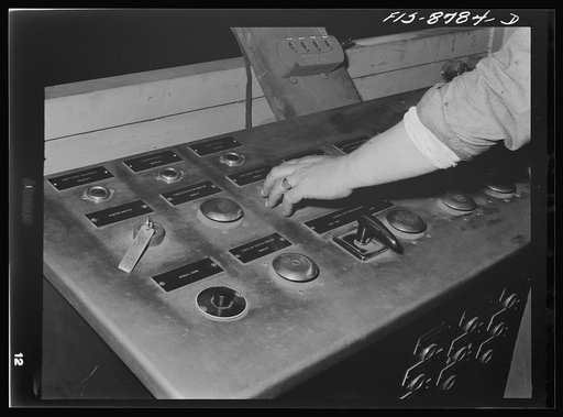 Great Falls, Montana. Anaconda Wire and Cable Company. Control board of a heating furnace and the rod mill. On this one board, one man located in a central position can advance and stop wire bars in any stage of their conversion from the blunt shaped wire bars to the extended rod from which the fini