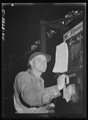 Great Falls, Montana. Anaconda Copper Mining Company. Workmen at control board of a stranding machine