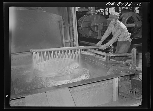 Great Falls, Montana. Anaconda Wire and Cable Company. After the annealing process, the treated wire is washed in water
