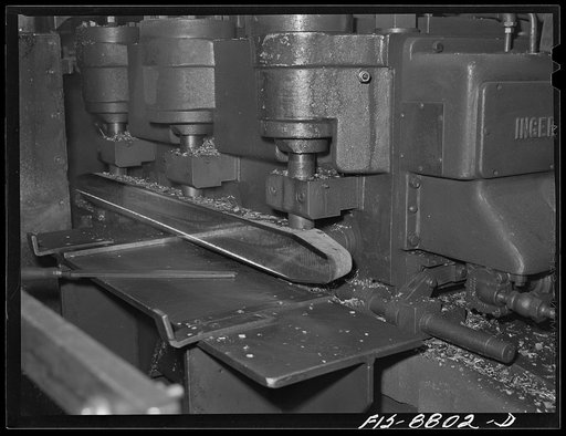 Great Falls, Montana. Anaconda Wire and Cable Company. Scalping the wire bar, or removing the oxidized top surface, is accomplished by a scalping machine; this is of advantage in meeting the exacting requirements of the mills