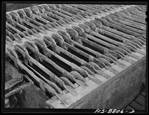 Great Falls, Montana, Electrolytic copper refinery of Anaconda Copper Mining Company. Refining tanks in which the anodes of impure copper are refined by electrolytic means to the pure cathode copper. The anodes are placed in the tank as they are received from the Anaconda smelters; between these ano