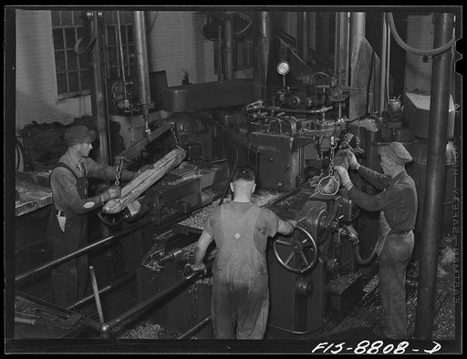 Great Falls, Montana. Anaconda Wire and Cable Company. Scalping the wire bar, or removing the oxidized top surface, is accomplished by a scalping machine; this is of advantage in meeting the exacting requirements of the mills