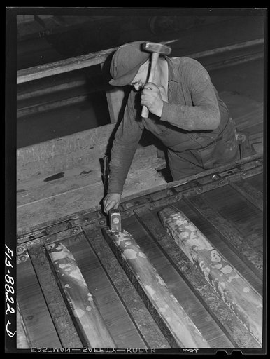 Great Falls, Montana. Furnace refinery of Anaconda Copper Mining Company. Every cast wire bar is stamped with an identification code which gives the date, shift, and the batch from which it was cast