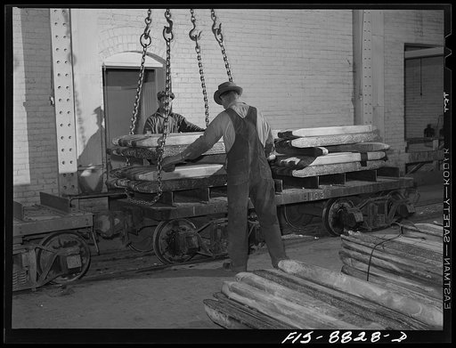 Great Falls, Montana. Anaconda Copper Mining Company. Loading wire bars onto railroad cars