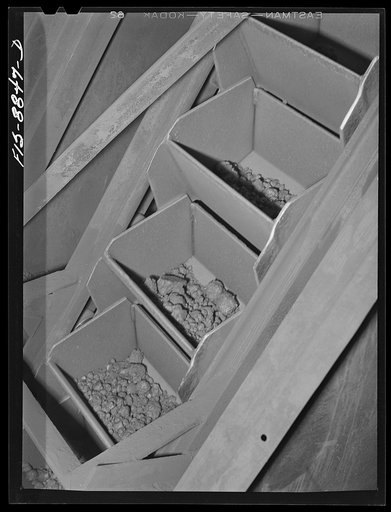 Anaconda smelter, Montana. Anaconda Copper Mining Company. Manganese concentrate in a conveyor