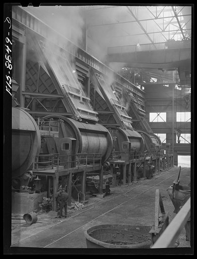 Anaconda smelter, Montana. Anaconda Copper Mining Company. Batteries of converters. Degree of processing in the converters is determined by the color of the smoke