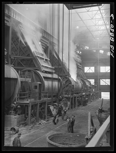 Anaconda smelter, Montana. Anaconda Copper Mining Compnay. Batteries of converters. Degree of processing in the converters is determined by the color of the smoke