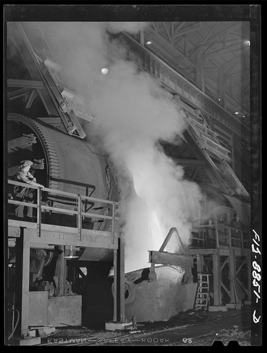 Anaconda smelter, Montana. Anaconda Copper Mining Company. Pouring molten copper from a converter