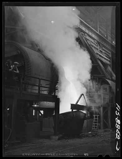 Untitled photo, possibly related to: Anaconda smelter, Montana. Anaconda Copper Mining Company. Pouring molten copper from a converter