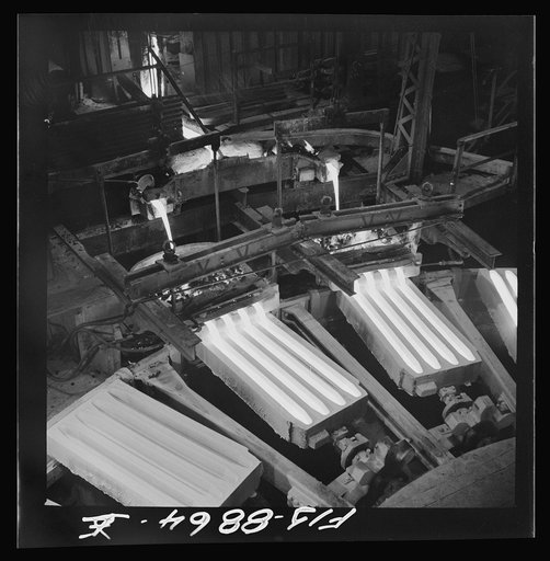 Untitled photo, possibly related to: Great Falls, Montana. Anaconda Wire and Cable Company. Pouring copper wire bars