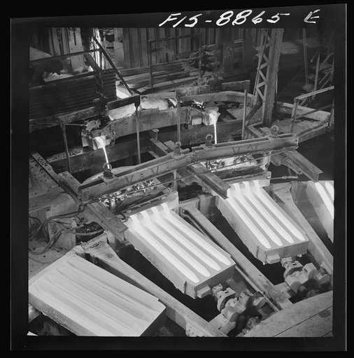 Untitled photo, possibly related to: Great Falls, Montana. Anaconda Wire and Cable Company. Pouring copper wire bars