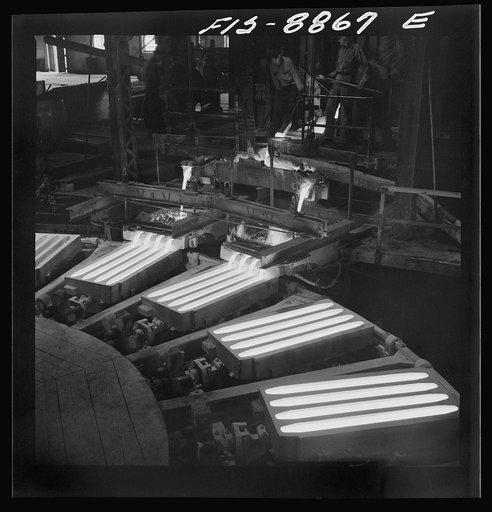 Untitled photo, possibly related to: Great Falls, Montana. Anaconda Wire and Cable Company. Pouring copper wire bars