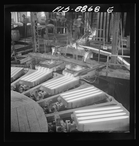 Untitled photo, possibly related to: Great Falls, Montana. Anaconda Wire and Cable Company. Pouring copper wire bars