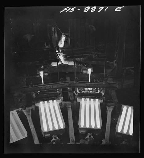 Untitled photo, possibly related to: Great Falls, Montana. Anaconda Wire and Cable Company. Pouring copper wire bars