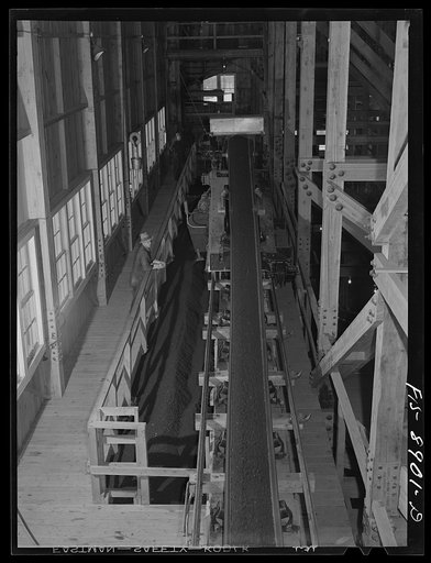 Ben Bow chromite mill, Stillwater County, Montana. Conveyor belt, which distributes ground chromite to the bins