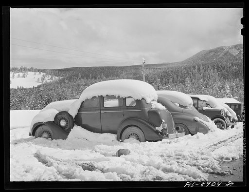 Ben Bow chromite mine, Stillwater County, Montana. The first snowfall of the season covered the miners' cars