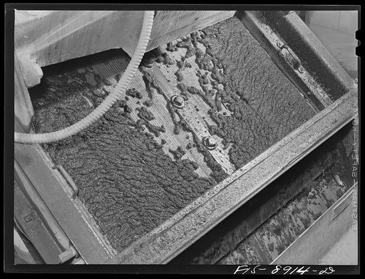 Ben Bow chromite mill, Stillwater County, Montana. Vibratory shaker used in processing chrome ore