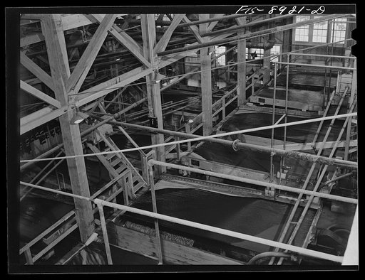 Ben Bow chromite mill, Stillwater County, Montana. Tables on which concentration of chrome ore is completed by a vibratory process