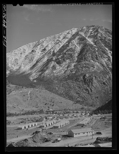 Mouat, Montana was recently constructed at the foot of one of the higher peaks in Stillwater County. Workmen at the Mouat chromite mill will live here