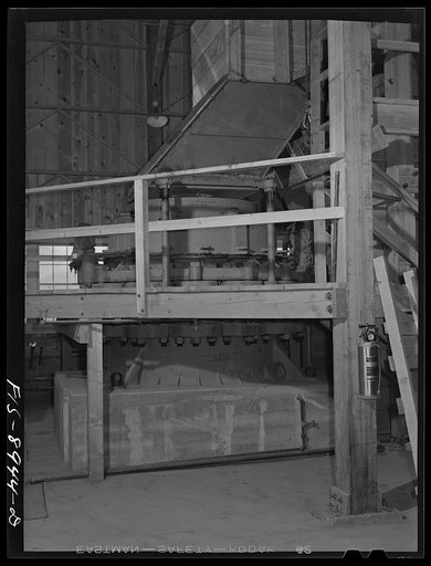 Ben Bow chromite mill, Stillwater County, Montana. Symons crusher which reduces the chrome ore in size