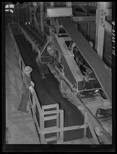 Ben Bow chromite mill, Stillwater County, Montana. Conveyor belt unloader which delivers the chrome ore to the desired bin