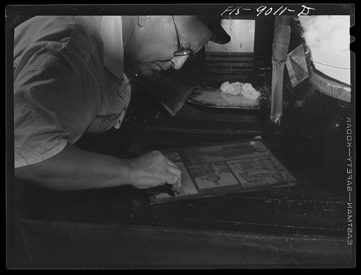 New York, New York. Photo engraving department of the New York Times newspaper. Developing a zinc plate