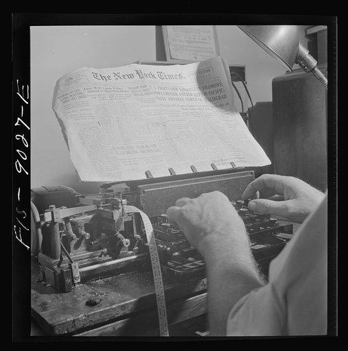New York, New York. Radio room of the New York Times newspaper. Times news passed by naval censor (see stamps on paper) is sent out twice daily by the Times' own short wave radio transmitter in international Morse code, and received by ships