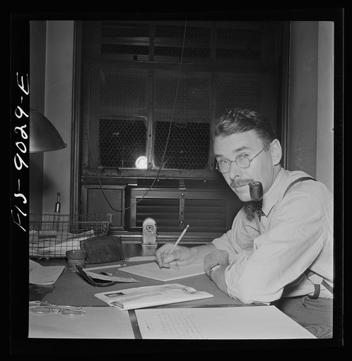 New York, New York. Drama department of the New York Times newspaper. Brooks Atkinson, drama critic, longhanding the review of a new play
