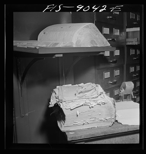 New York, New York. "Morgue" of the New York Times newspaper. Old and new dictionaries