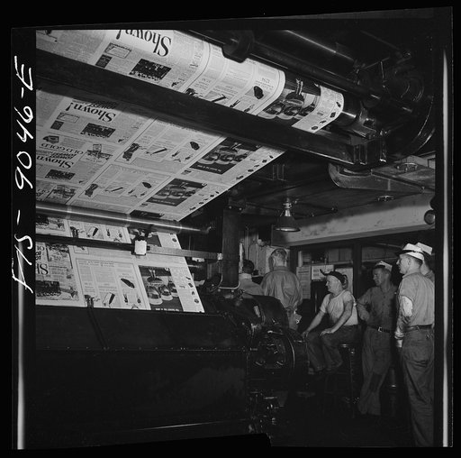 New York, New York. Pressroom of the New York Times newspaper. Presses start rolling