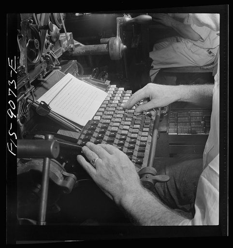 New York, New York. Composing room of the New York Times newspaper. Linotyper's hands