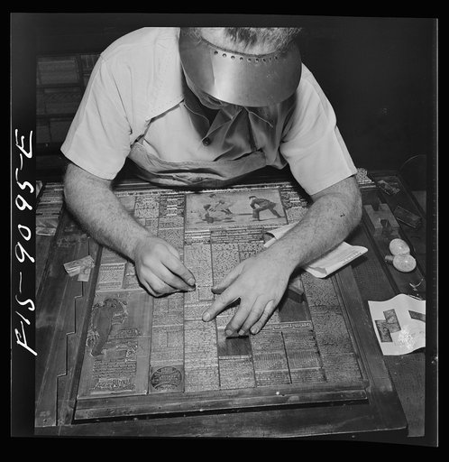 New York, New York. Composing room of the New York Times newspaper. Making up the sport page