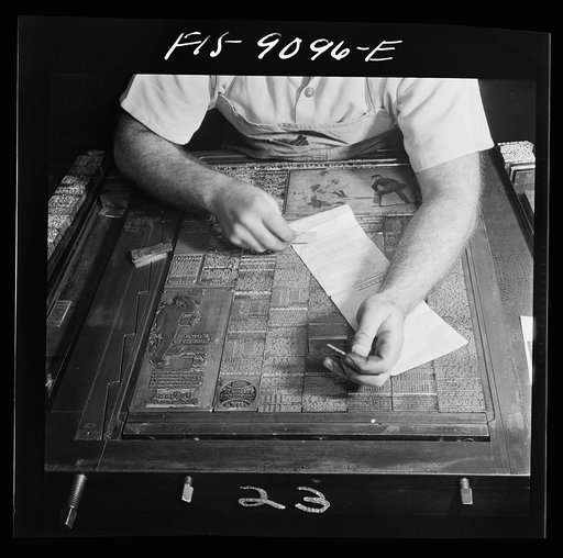 New York, New York. Composing room of the New York Times newspaper. Making up the sport page