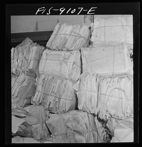 New York, New York. Mailroom of the New York Times newspaper. Unsold copies of paper are returned, sold for scrap