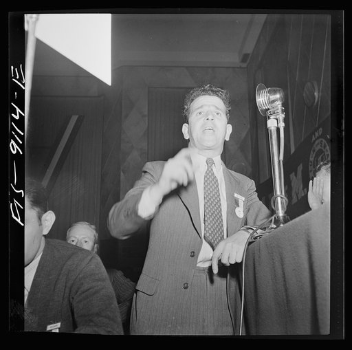 New York, New York. Marine and shipbuilding workers convention. Flynn, a leader of the New Jersey local, addressing the union convention at the Hotel New Yorker